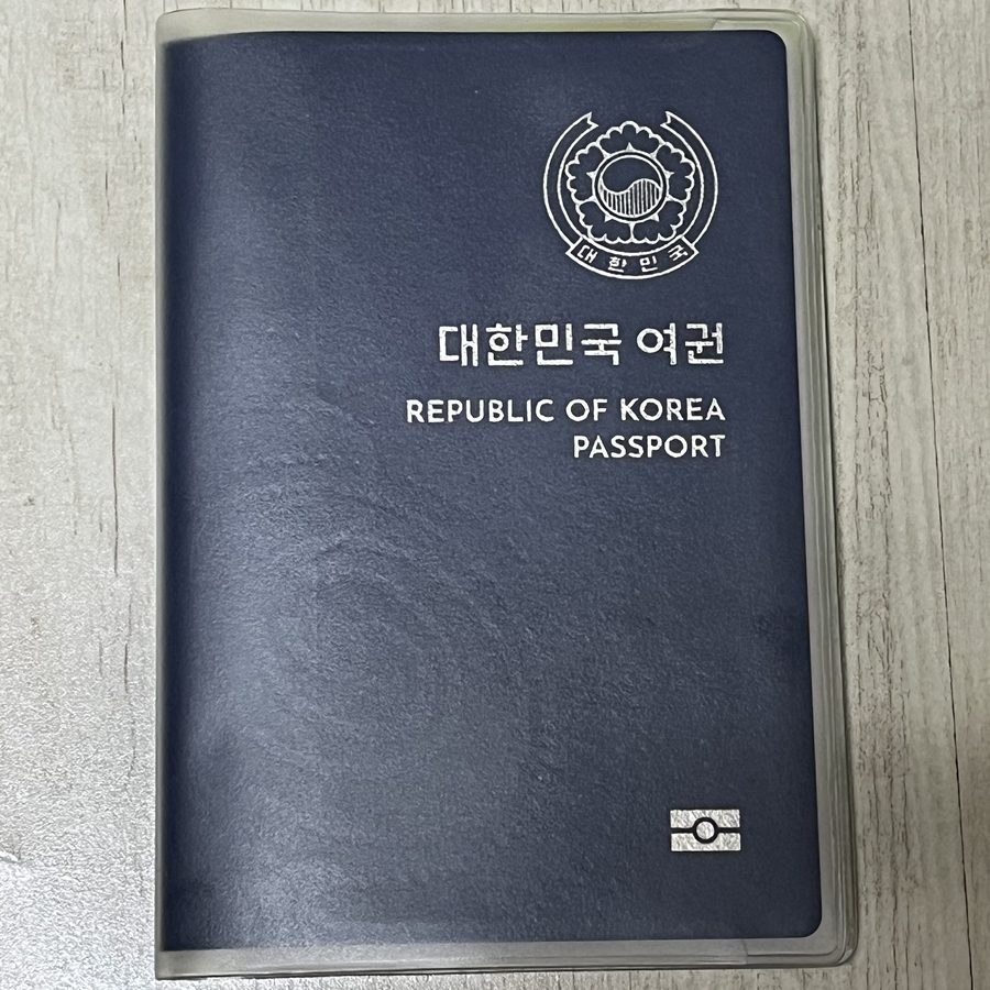 The cover of my Republic of Korea passport, photographed by me on my desk — name and passport number aren't visible